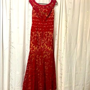 Deep read, lace overlay, fit and flare gown